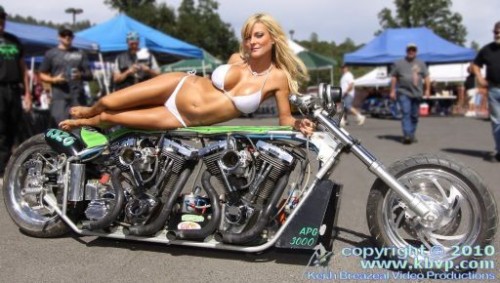 Sara prone on Bozzie Customs drag bike.preview.JPG