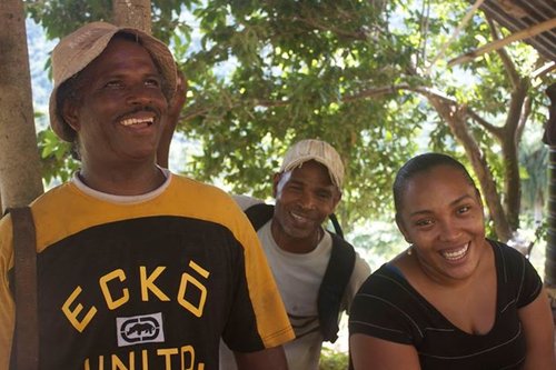 Peter Alexander and his daughter Ammelia on their farm in La Canoa.jpg
