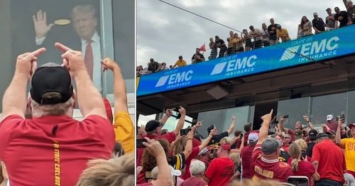 donald-trump-loudly-booed-and-flipped-the-bird-by-iowa-football.jpg