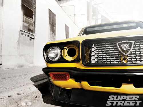 sstp_1002_04_o+1973_mazda_rx_3+re_badge.jpg